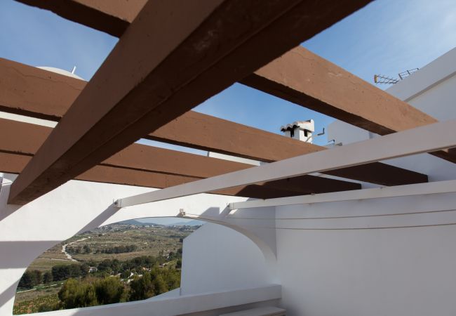 Casa adosada en Moraira - Villa en Moraira con chimenea y free Wifi Casa adosada en Moraira - Villa en Moraira con chimenea y free Wifi